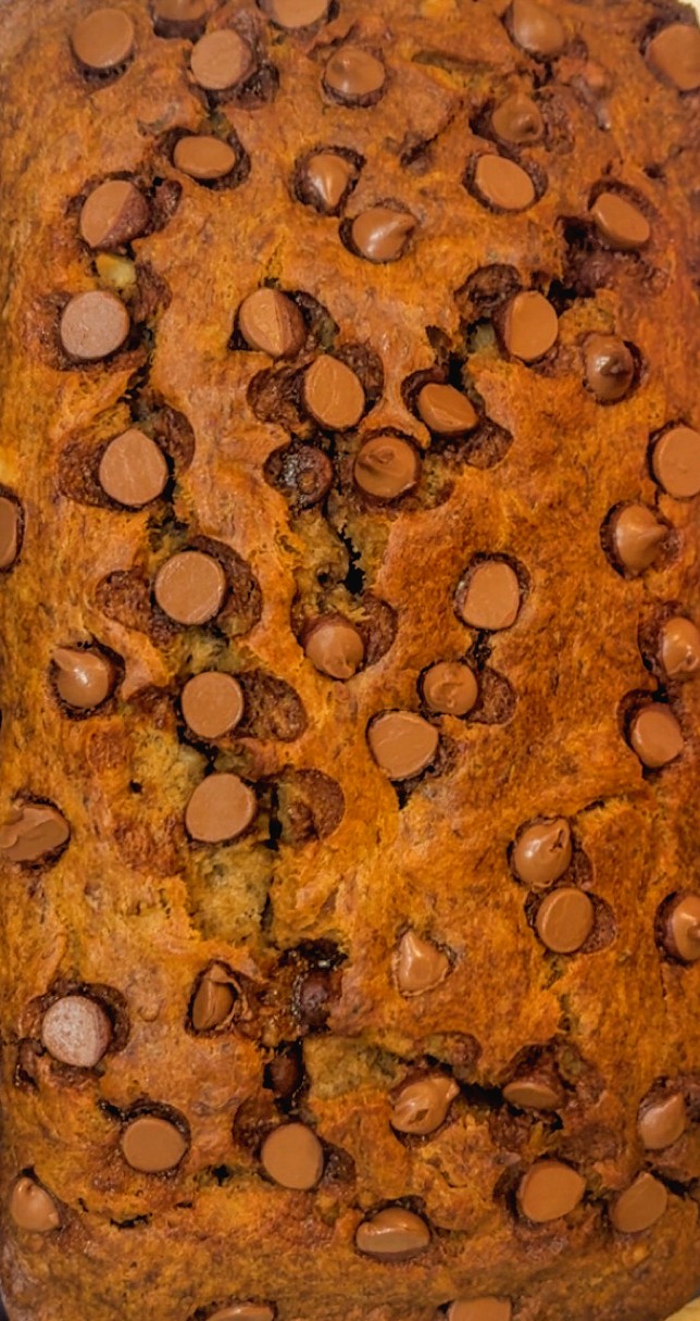 Golden banana bread topped with chocolate chips